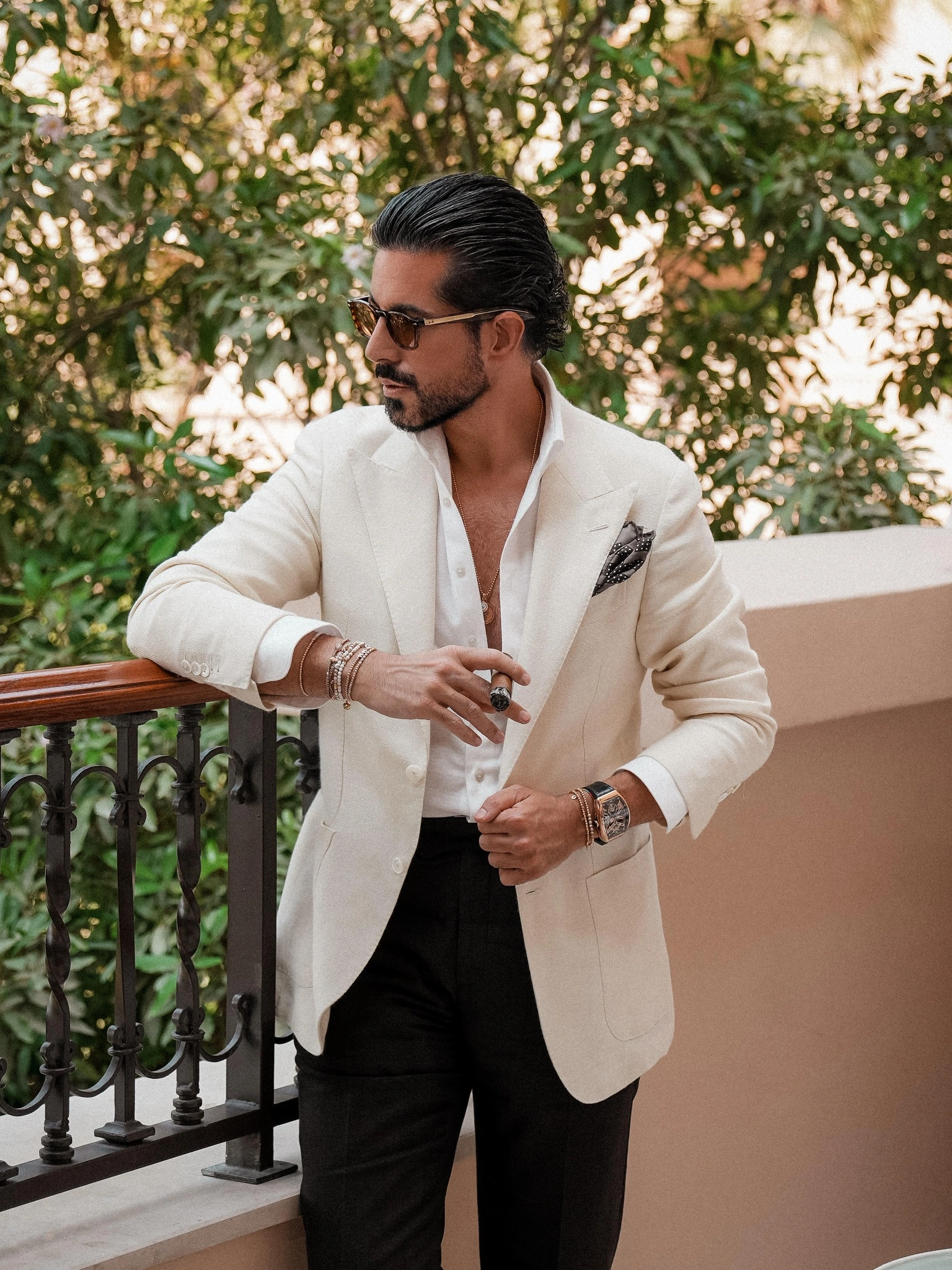 Anil Arjandas on a balcony